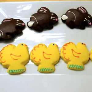 bennisons-bakery-easter-cookies Picture of bunny and chicken shaped cookies on a plate